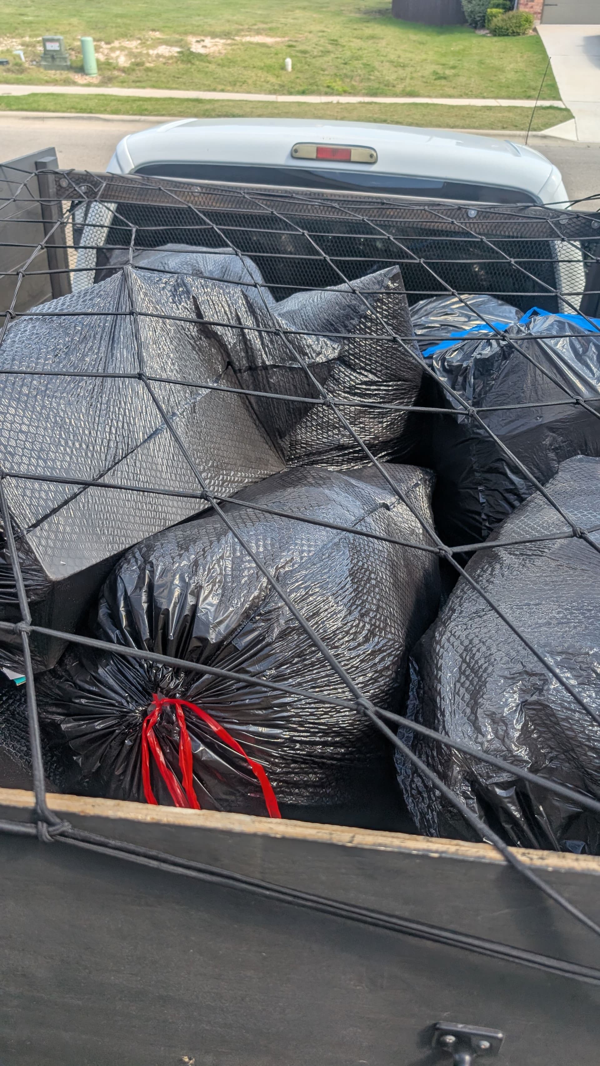 Leander Garage Cleared of a Full Load of Packing Paper