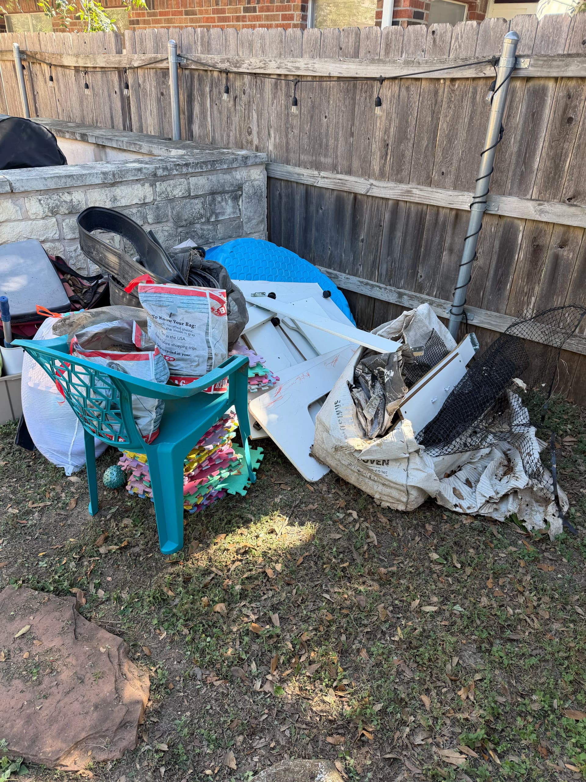 Gallery photos for Backyard Cleanout Clears the Clutter in Pflugerville: Image #1